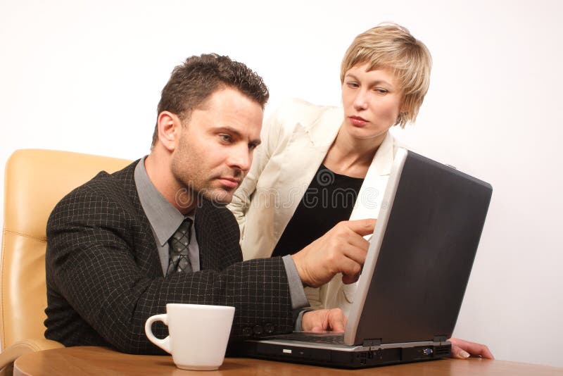 Man and woman working together in the office. Man and woman working together in the office