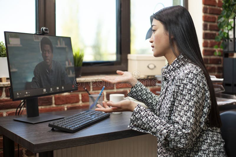 Business partners collaborate remotely stock image