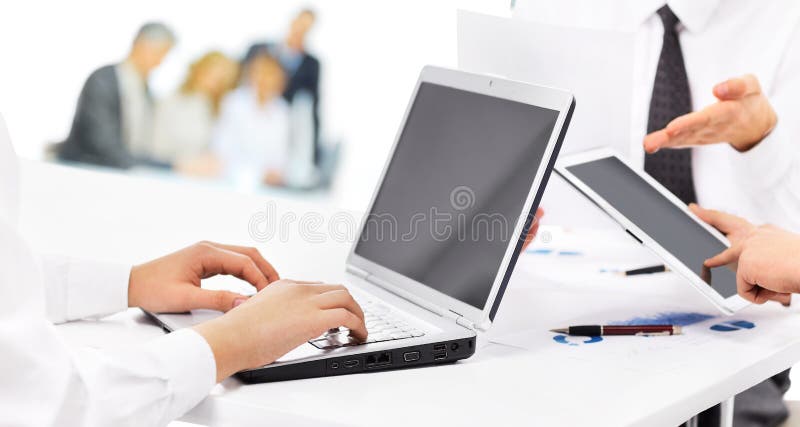 Business partners using laptop