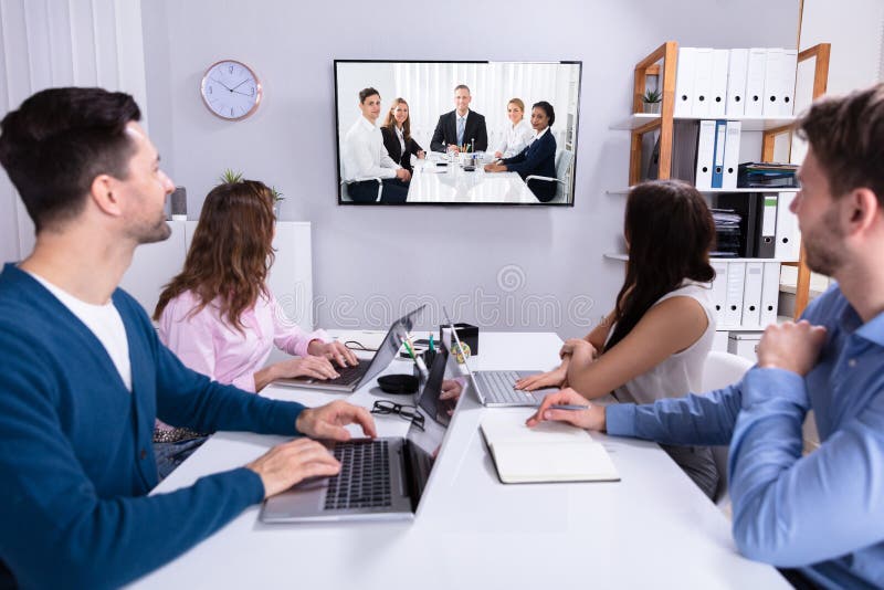 Business People Attending Videoconference Meeting Stock Image - Image
