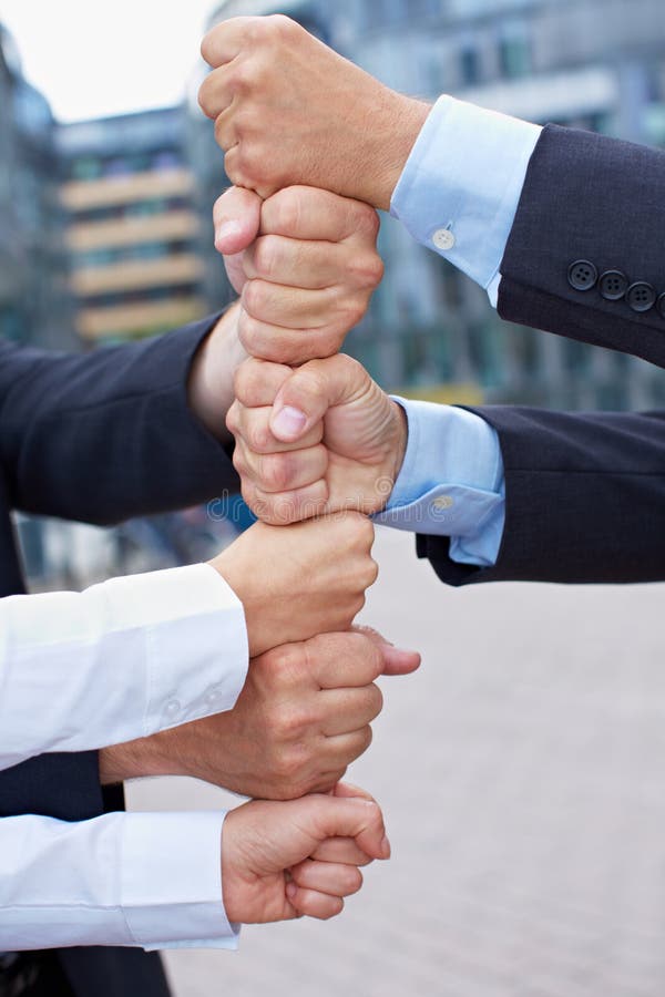 Business people building tower royalty free stock photography