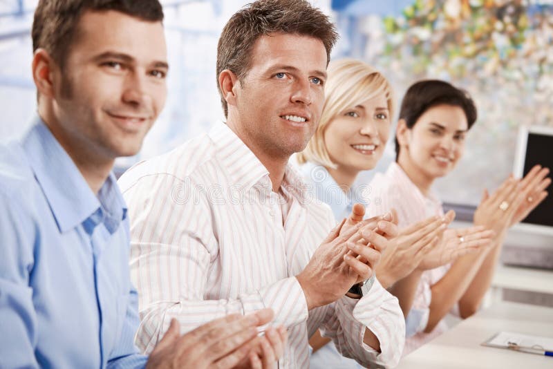 Business people clapping at meeting royalty free stock photography Business people clapping at meeting royalty free stock photography