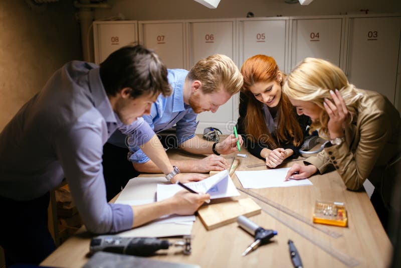 Business People Collaborating In Office And Working On Project Together