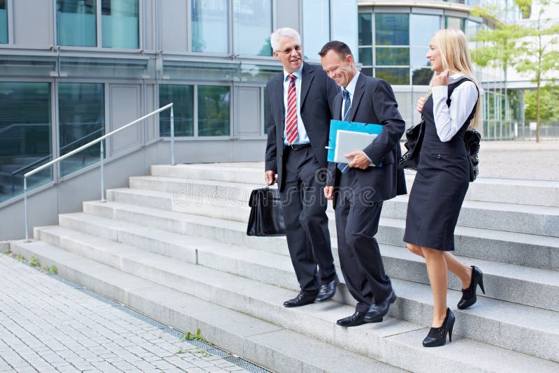 Business people descending stock images