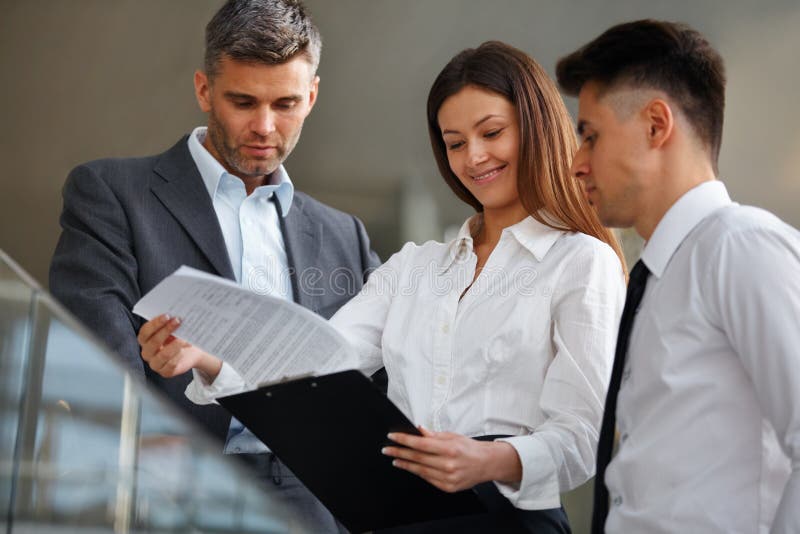 Business people discussing documents and ideas. Business Team stock image