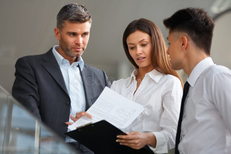Business people discussing documents and ideas. Business Team stock photos