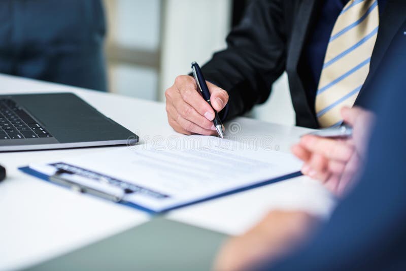 Business people discussing business graphs showing the results of their successful teamwork in the office royalty free stock images