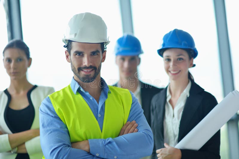 Business people and engineers on meeting royalty free stock images
