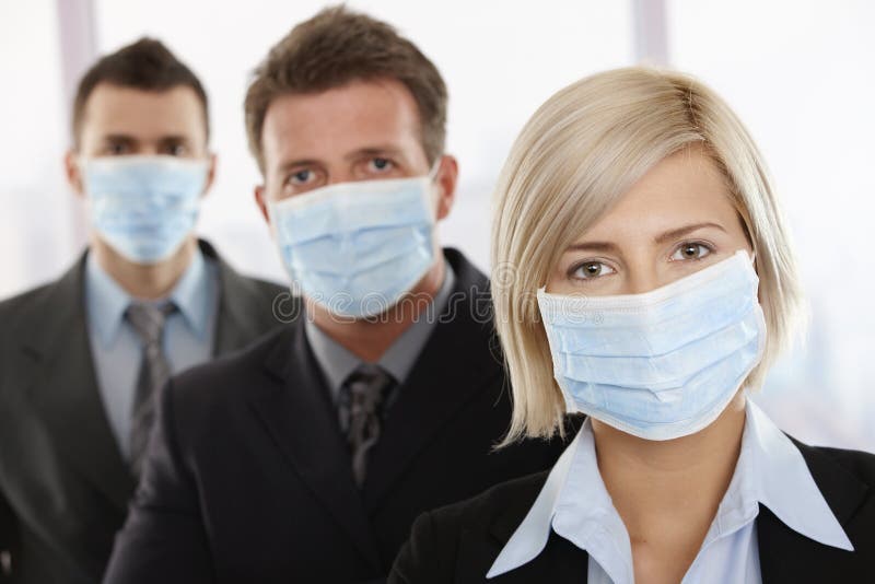 Business people fearing h1n1 virus stock photo