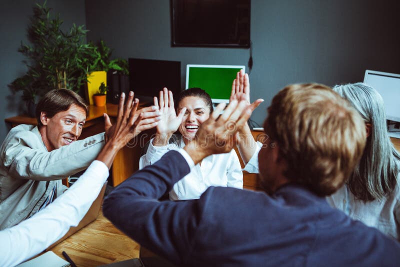 Business People Giving Each Other High Five And Clapping Business Team