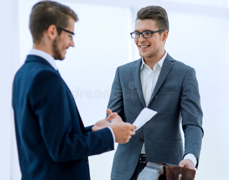 Business people greet each other with a handshake stock photos Business people greet each other with a handshake stock photos