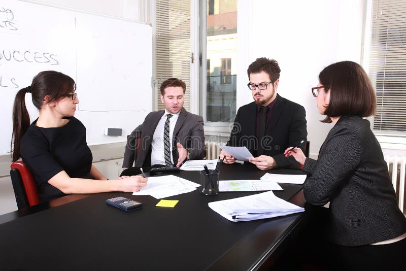 Business people having board meeting