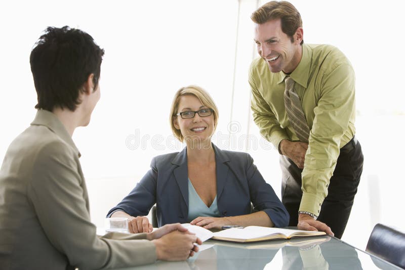Business People Having Discussion At Conference Table royalty free stock photo