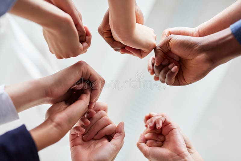 Business people hold hands for team building royalty free stock images