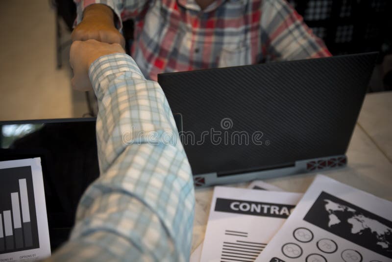 Business people making a fist bump. Start up business teamwork. stock photography Business people making a fist bump. Start up business teamwork. stock photography