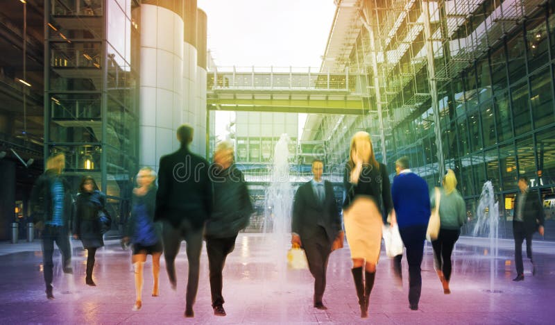 Business people moving blur. People walking in rush hour. Business and modern life concept