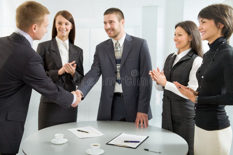 Business people shaking hands