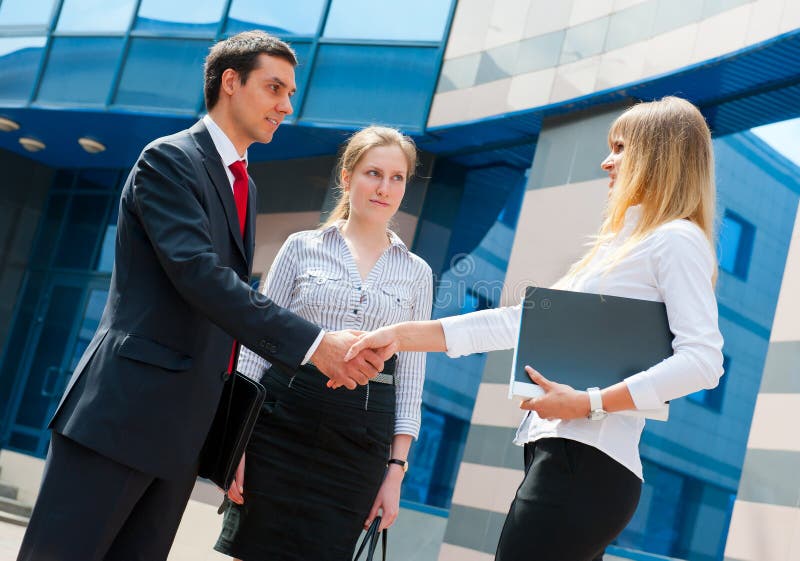 Business people shaking hands