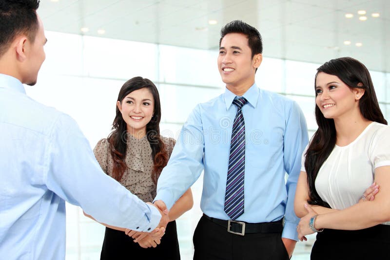 Business people shaking hands royalty free stock photography