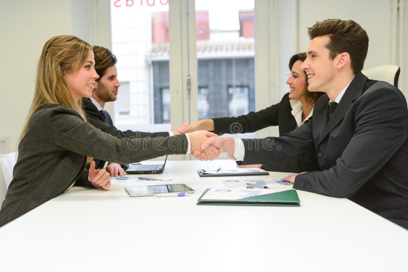 Business people shaking hands