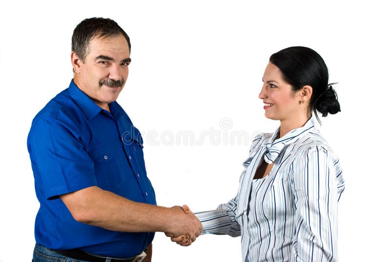 Business people shaking hands and smiling