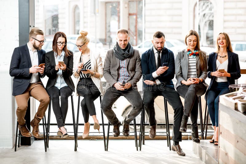 Business people sitting near the window stock photos Business people sitting near the window stock photos