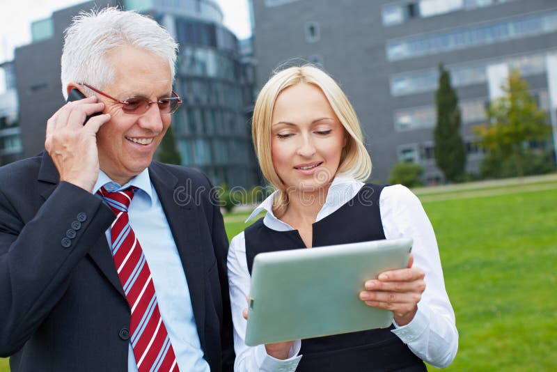 Business people with smartphone royalty free stock images