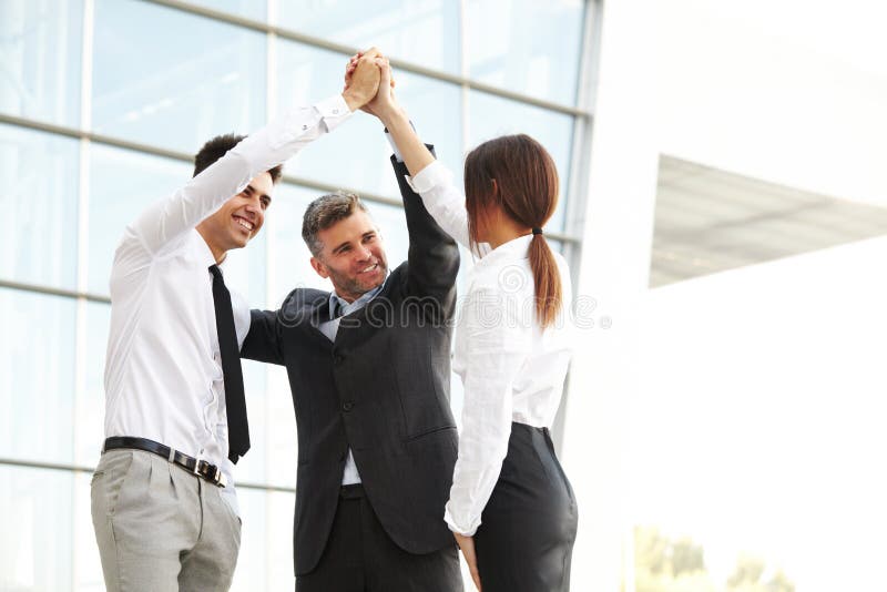 Business People. Successful Team Celebrating a Deal stock photos
