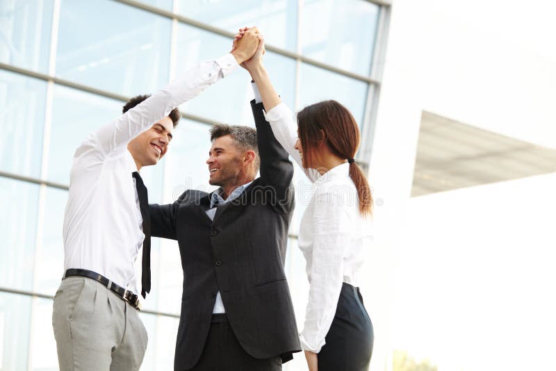 Business People. Successful Team Celebrating a Deal stock photos