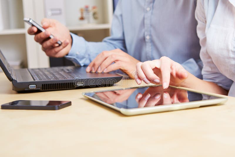 Business people with tablet stock image