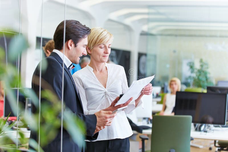 Business people talking about stock images