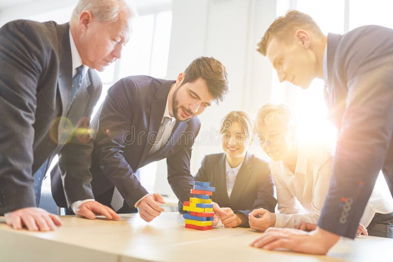 Business people in team building workshop royalty free stock photo