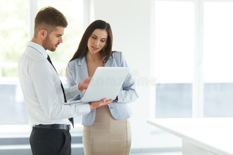 Business People Using Laptop Computer at Ofiice stock photos