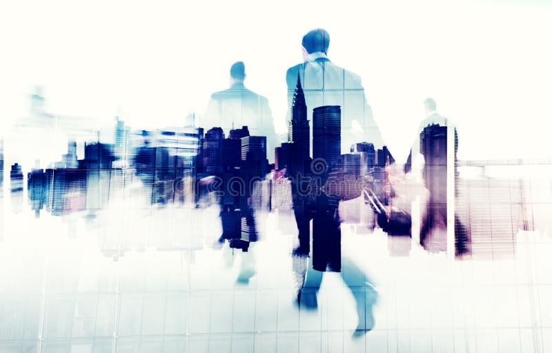 Business People Walking on a City Scape stock image