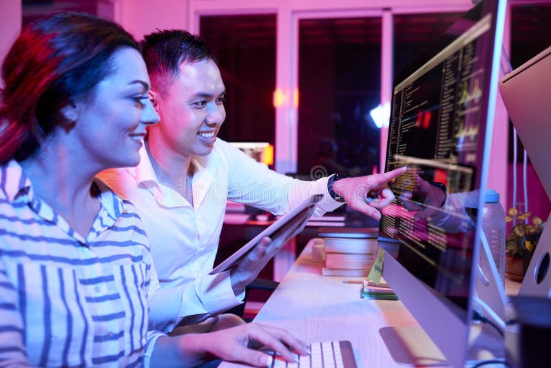 Business people working with computer program at office stock photo