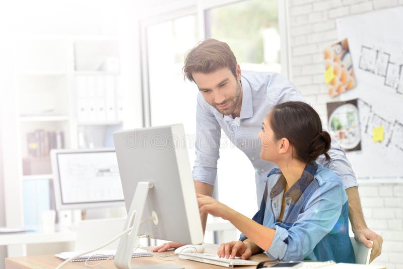 Business people working odesktop computer