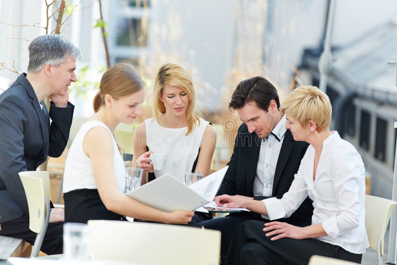 Business people working in team stock image