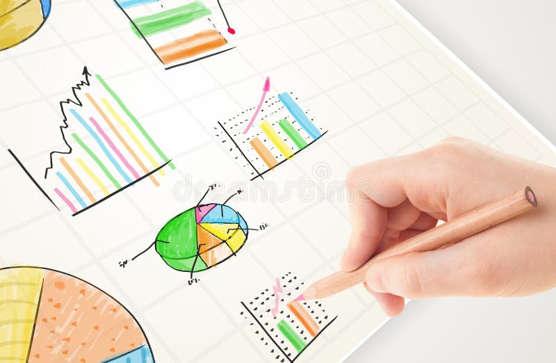 Business person drawing colorful graphs and icons on paper