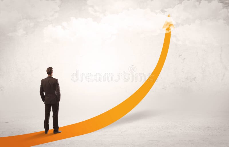 Business person standing on orange arrow