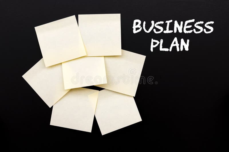 Business Plan text with yellow stocky notes stock photography