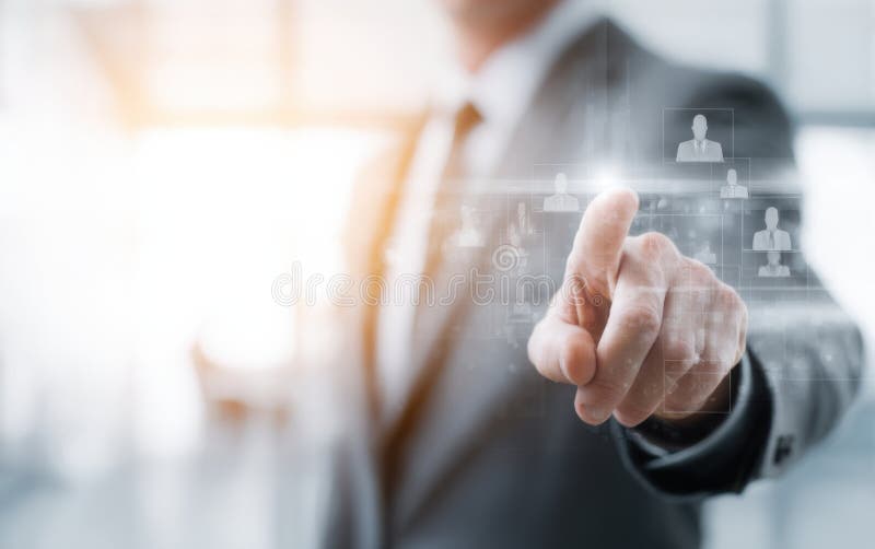 Business professional interacting with digital interface for networking in modern office setting stock photo