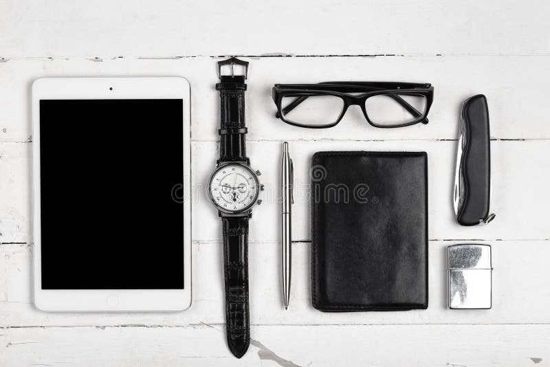 Business still-life with tablet computer glasses and cigarette l