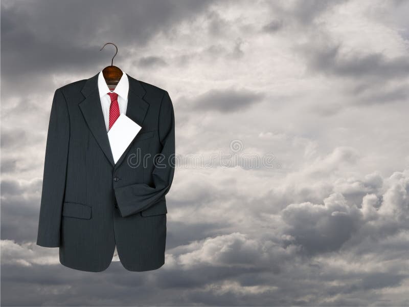 Business suit hung up with envelope - will, inheritance metaphor