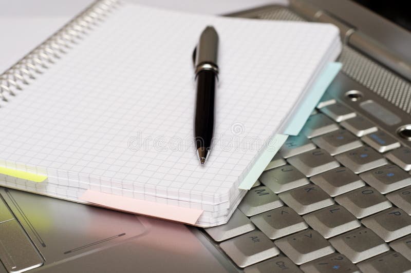 Business Taking Notes by a Laptop Stock Photo Image of laptop