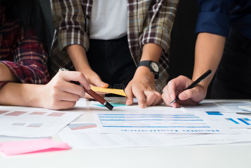 Business team adviser analysis financial data. Business team adviser analysis financial data on paper denoting the progress in the work,consult concept.
