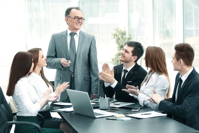 Business team applauding leaders at the meeting. stock images Business team applauding leaders at the meeting. stock images