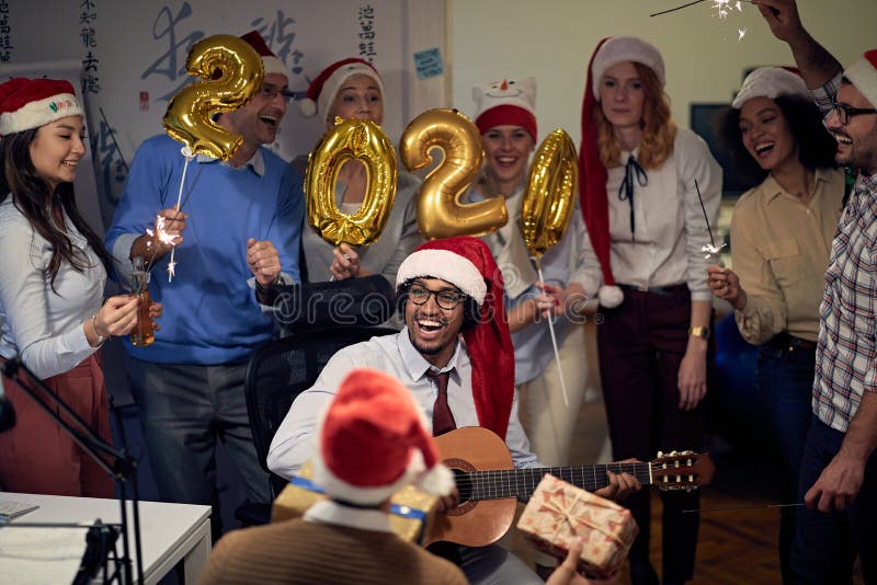 Business team celebrating new 2020 year in office royalty free stock photos Business team celebrating new 2020 year in office royalty free stock photos