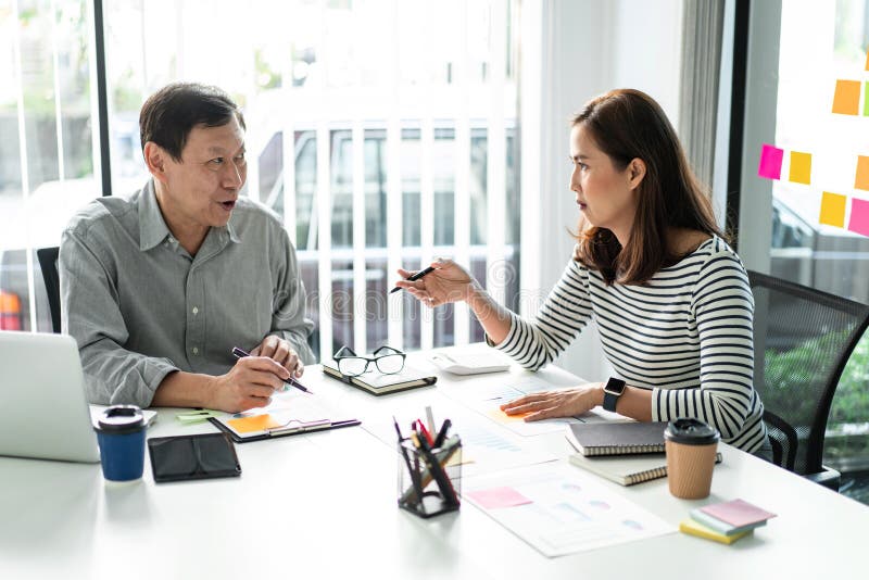Business team colleagues consultation and discussion marketing plan meeting on the financial report and analyzing investment royalty free stock photography