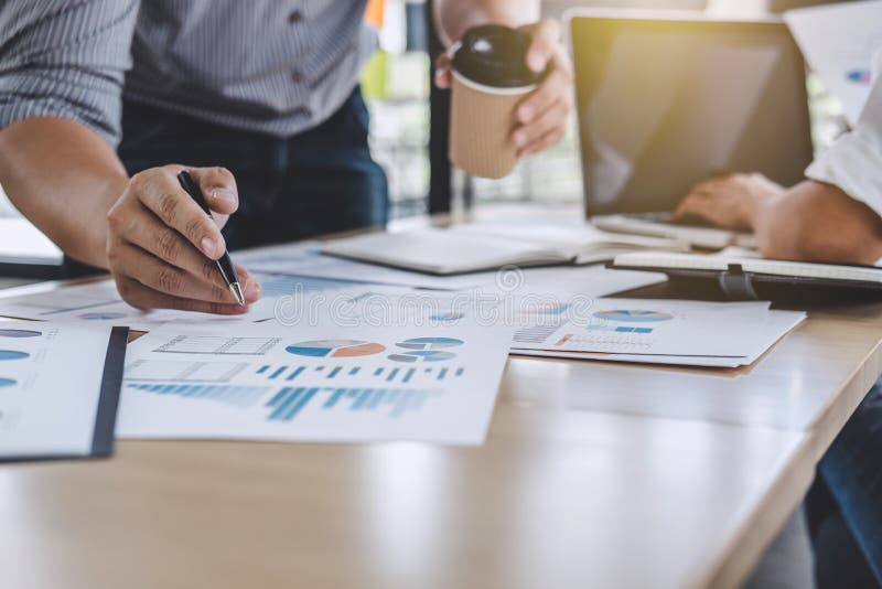 Business team colleagues discussing working analysis with financial data and marketing growth report graph in team, Meeting stock images