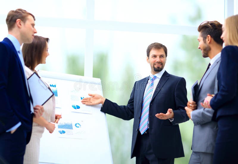 Business team discussing acquisition in meeting royalty free stock photography Business team discussing acquisition in meeting royalty free stock photography